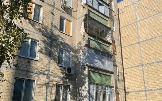 Enemy shelled Nikopol district with artillery and attacked with drones: multi-storey building is damaged. PHOTOS