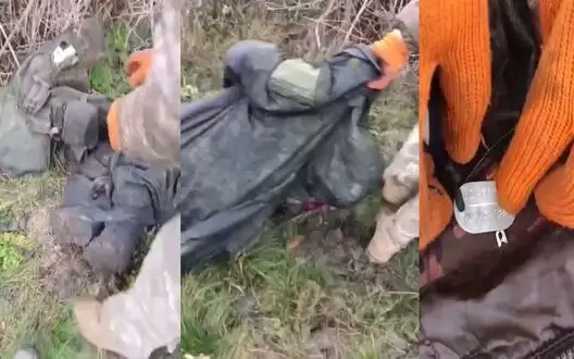 Soldiers are thinking about what to do with body of eliminated occupier: "Let’s drag him into weeds," - "I will not take this f#cker. Let dogs eat him". VIDEO 18+