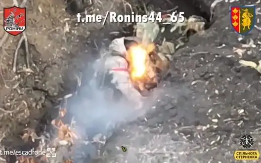 Russian invader burns alive after kamikaze drone attack. VIDEO