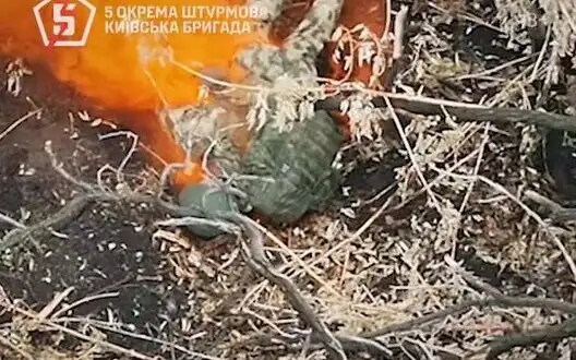 Occupier tries to extinguish fire that engulfed his leg, but ammunition drop finishes off Russian. VIDEO