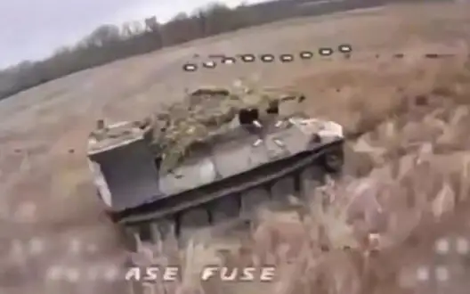 Soldiers of 14th SMB used drone on fiber optics to strike occupiers’ armored vehicle. VIDEO