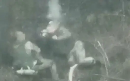 Russian man raises his head and "catches" bullet with back of his head during battle. VIDEO