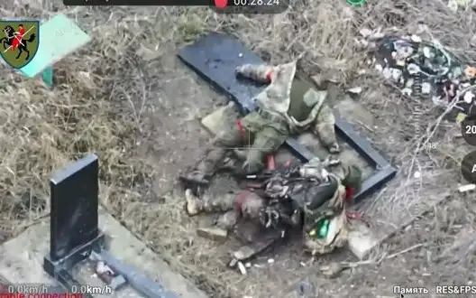 Bodies of occupiers lie on gravestones of cemetery near village of Velyka Novosilka in Donetsk region.. VIDEO