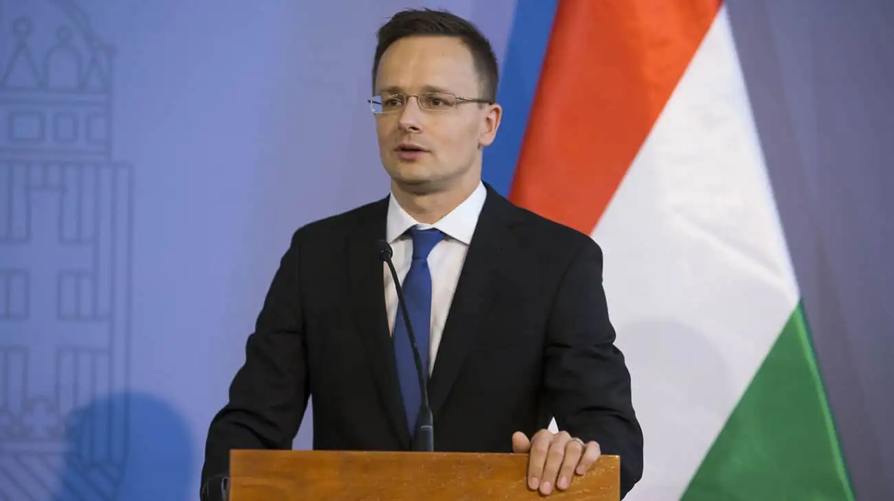 Hungary's foreign minister reiterates threat to block extension of sanctions against Russia