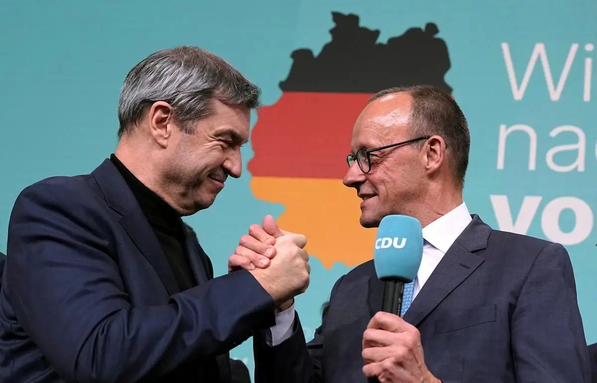 Conservatives win German election while far-right party surges to second place