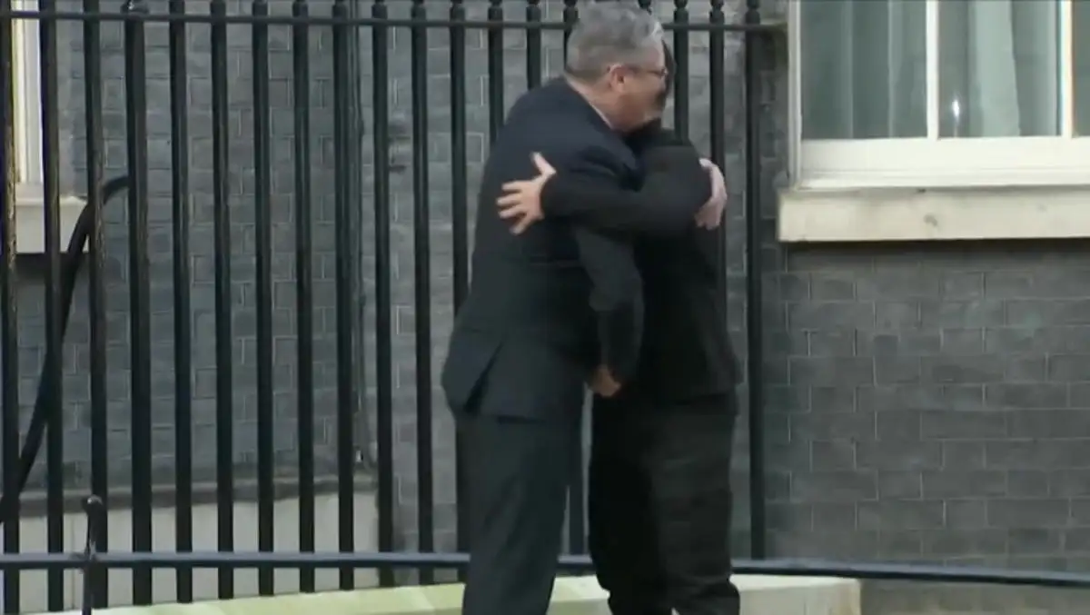 Volodymyr Zelensky greeted with warm hug from Keir Starmer outside Downing Street after Donald Trump showdown