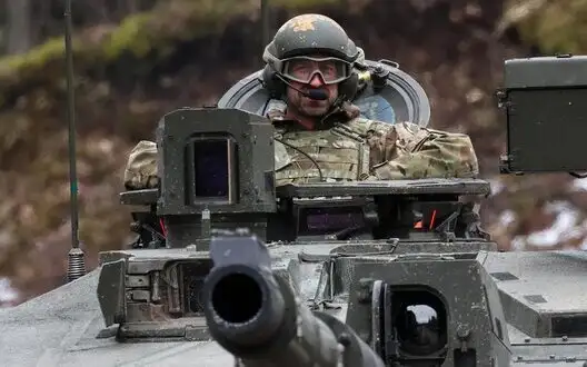 Prince William rides Challenger tank near border with Russia during his visit to Estonia. PHOTOS