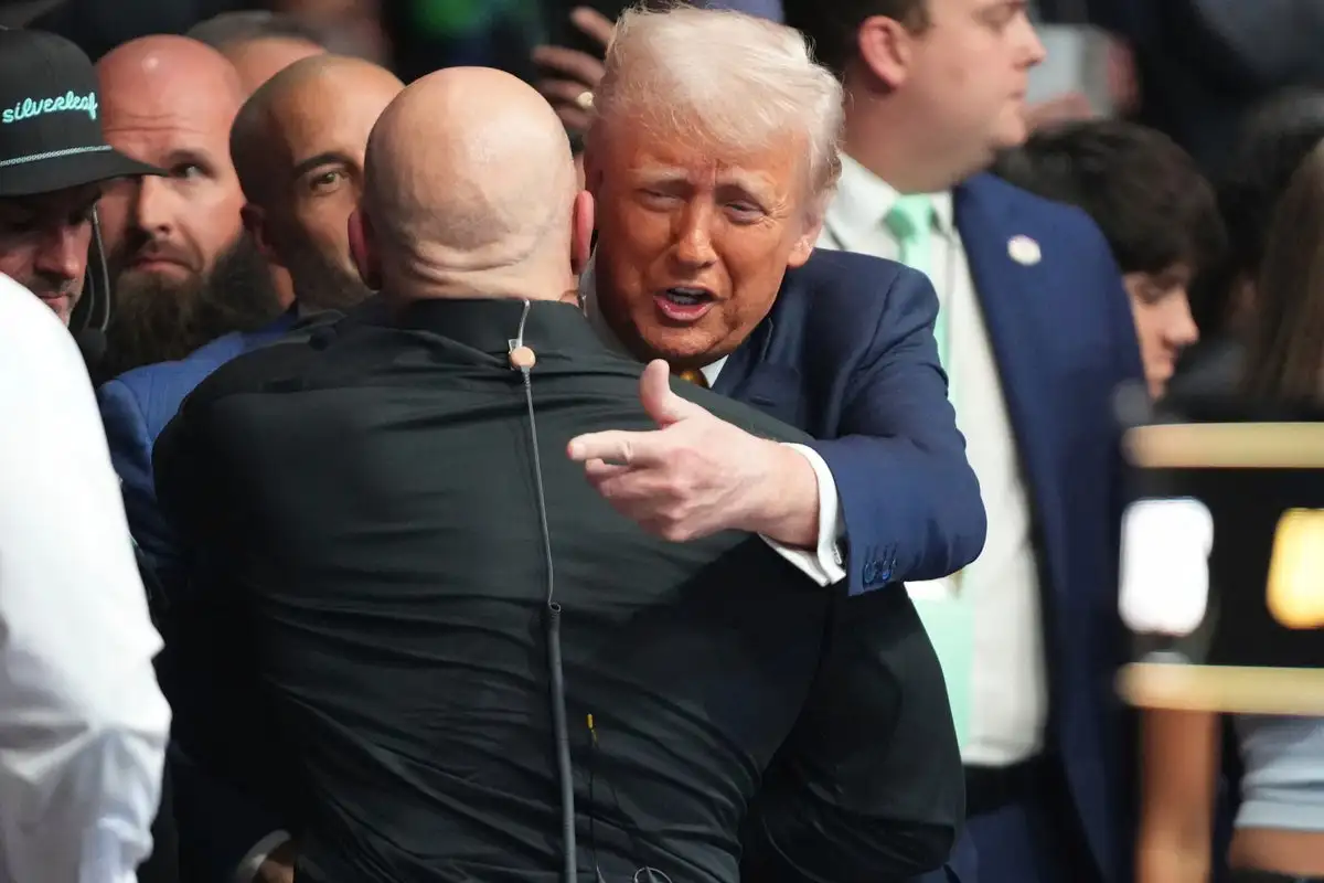 Trump sits cageside at Miami UFC event in his latest appearance at a sports event