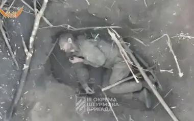 Russian infantryman dying in field in Kharkiv region as result of attack by fighters of 3rd SAB. VIDEO