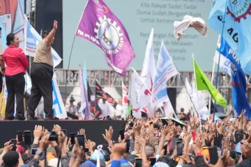 From Tokyo to Los Angeles, workers observe May Day as many express worries about Trump