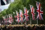 Thousands of people gather near Buckingham Palace to mark the 80th anniversary of V-E Day