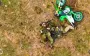 Russian invader writhes in field after losing his leg. VIDEO