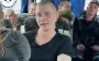 In first minutes on his native soil, soldier of Armed Forces of Ukraine, freed from captivity, sings "Chervona Kalyna". VIDEO