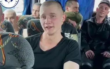 In first minutes on his native soil, soldier of Armed Forces of Ukraine, freed from captivity, sings "Chervona Kalyna". VIDEO