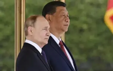 Xi Jinping calls on Putin for "fair" peace deal for first time - Bloomberg