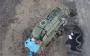 Occupants running out of burning "Tor-M2" air defence system after successful attack by Ukrainian drones. VIDEO