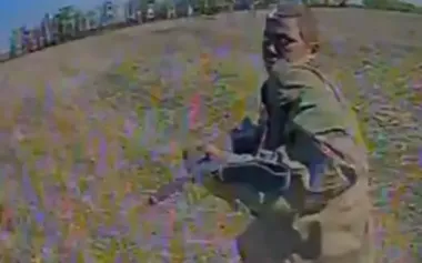 Drone catches up with African mercenary of Russian army in field. VIDEO