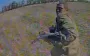 Drone catches up with African mercenary of Russian army in field. VIDEO