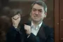Russia convicts a prominent election monitoring activist and sentences him to 5 years in prison