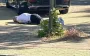 Murdered Portnov lies on ground. PHOTO