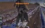 Kamikaze drone hits Russian soldier in head while he walks alone across field. VIDEO