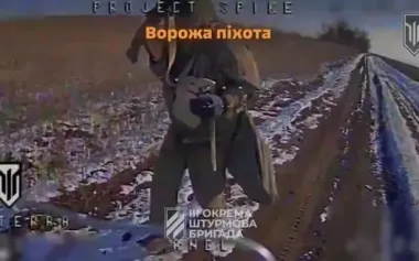 Kamikaze drone hits Russian soldier in head while he walks alone across field. VIDEO