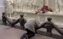 Elderly Russian man crossing himself and bowing in front of monument to Stalin in Moscow metro. VIDEO