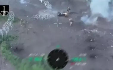 Two occupiers on motorcycles were first struck by kamikaze drone and subsequently killed in land mine blast. VIDEO