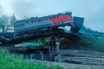 Explosions caused 2 bridges in western Russia to collapse, officials say. Seven people were killed