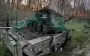 Drone operators from 63rd SMB hunt down Russian tank in forest. VIDEO