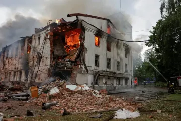 Emergency workers search for survivors after aerial attack on Kharkiv kills 3