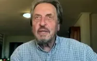 Musk’s father praises Putin and Russia in Moscow