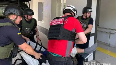 Volunteers of Ukrainian Red Cross providing first aid to victim of enemy drone in Nikopol
