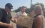 Representative of occupying authorities in Skadovsk presented father of Russian soldier who was killed in action with microwave oven: "Thank you for your son". VIDEO