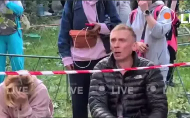 Couple crying near destroyed house in Kyiv: their son is under rubble. VIDEO