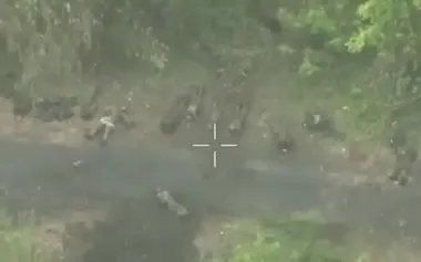 Bodies of 17 Russian assault troops lie in the open field at border with Sumy region. VIDEO