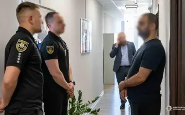 Wanted by FBI: member of hacker group detained in Kyiv and extradited to United States. PHOTOS