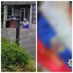 В Винницкой области во время похорон бойца мужчина завернулся в триколор РФ (фото)