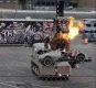 Съеденный роботом-динозавром: самое быстрое авто 2000-х уничтожили на глазах тысяч зрителей (видео)