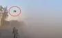 Soldier with shotgun destroys Russian kamikaze drone that flew close to pickup truck. VIDEO