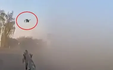 Soldier with shotgun destroys Russian kamikaze drone that flew close to pickup truck. VIDEO