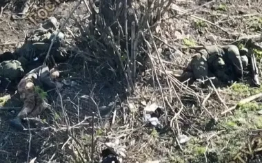Dozens of bodies of eliminated occupiers lying on street of Ukrainian village and on remains of destroyed houses. VIDEO 18+
