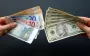 Долар упав до світових валют до мінімуму за 3,5 року