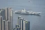 Chinese aircraft carrier sails into Hong Kong to boost patriotism