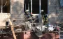 Ніч теророру в Києві: розбиті будинки та вирви у дворах, місто в диму - репортаж РБК-Україна