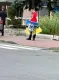 Чоловік розгулював Києвом з прапором зі свастикою: поліція відреагувала (фото)