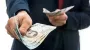 Українцям можуть виплатити по 7 000 доларів: кому передбачені гроші