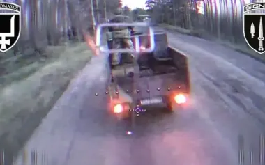 Kamikaze drone attacks rare enemy UAZ "Cargo" truck with Russian inside the cargo bed. VIDEO