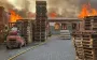 Due to night attack by Russian Federation, factory in Trebukhiv, Brovary district, is on fire. PHOTOS