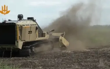 Combat engineers clear farmland in deoccupied territories using mechanized demining machine. VIDEO